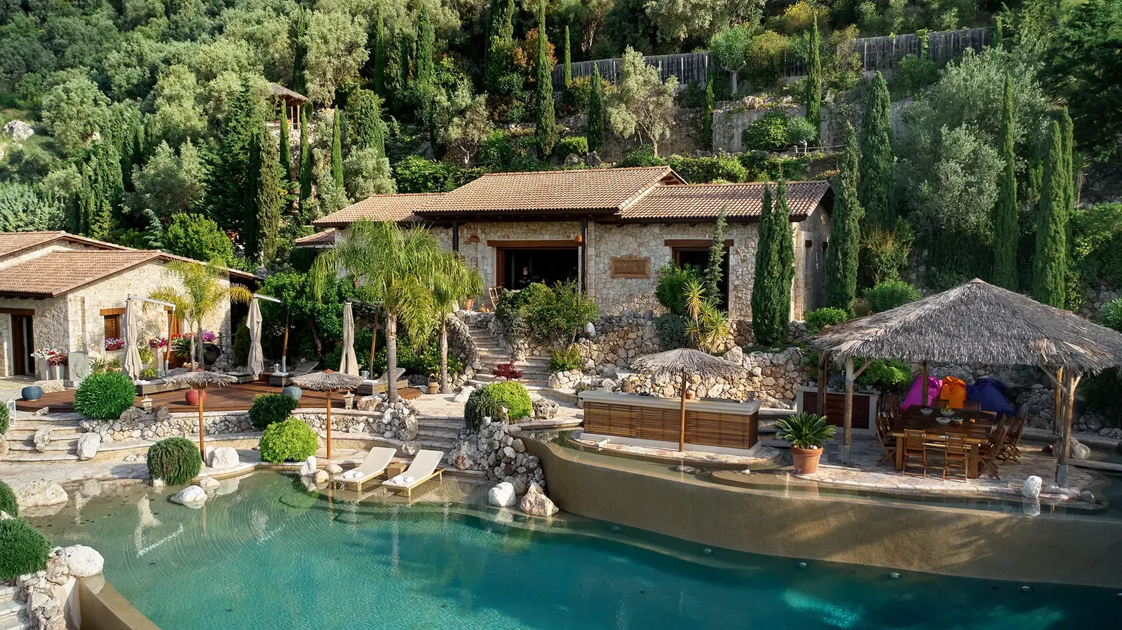 Mimosa’s pool terrace and stone villas among the olive trees
